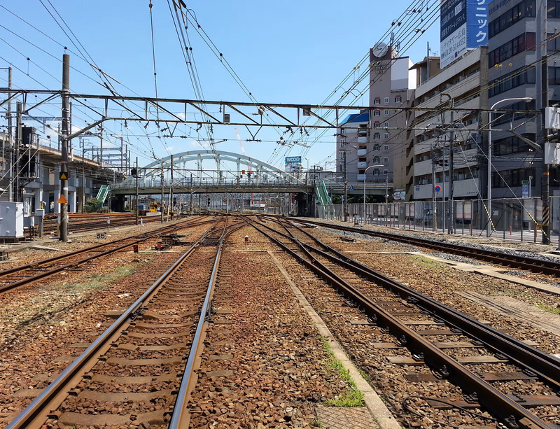 A photograph of a railway station in Hiroshima, Japan.
