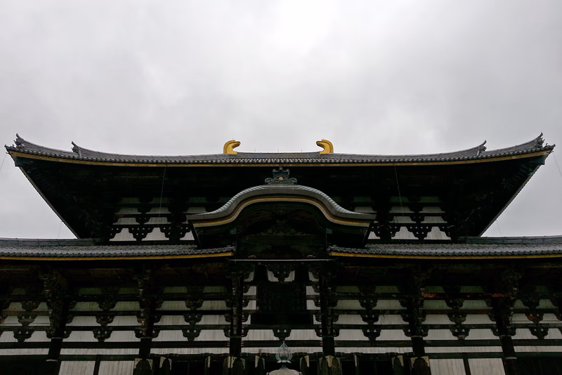 A photo of a traditional Japanese building with a pagoda-style roof.