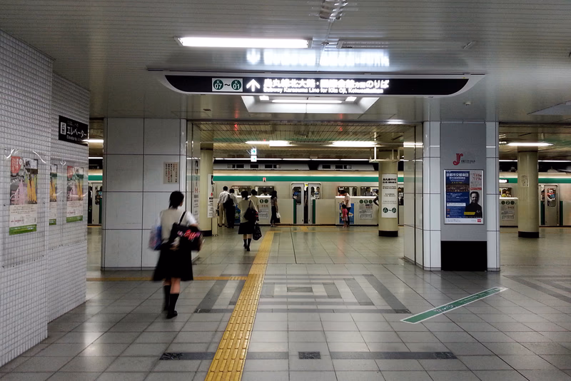 A photograph of a train station in Kyoto, Japan.