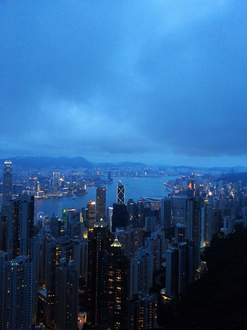 A photo of a cityscape taken from a high angle during the evening
