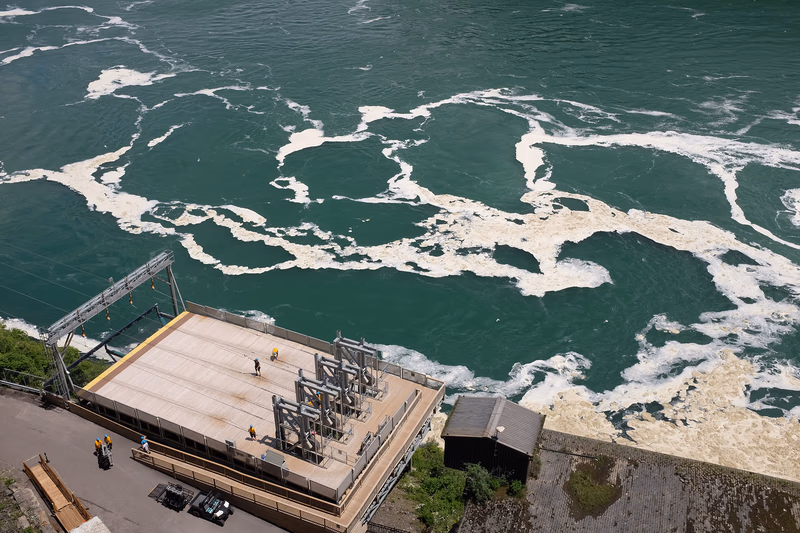 Aerial view of the Niagara River with the Horseshoe Falls in the background