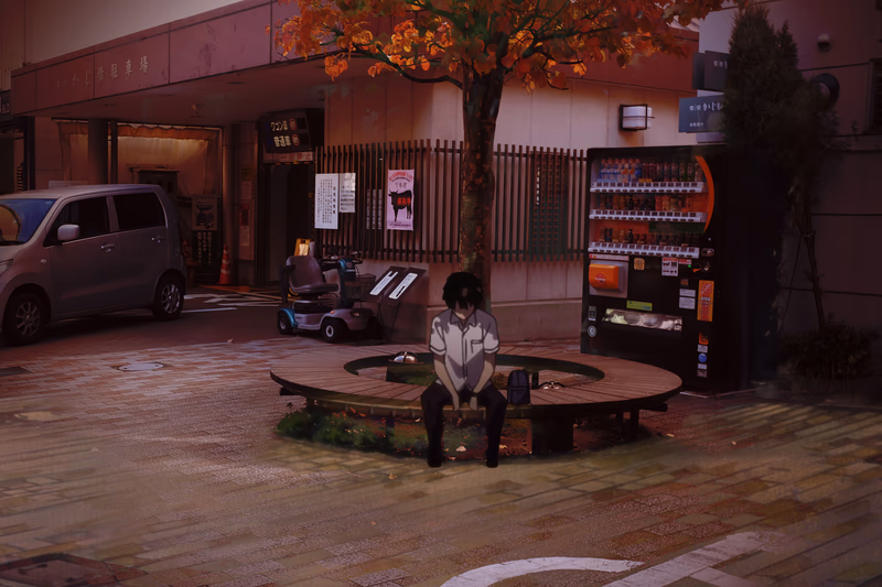 A man sits on a bench in a quiet street, surrounded by a tree and a kiosk. A car is parked nearby, and a building with a sign that says 'Takayama, Gifu, Japan' is in the background.