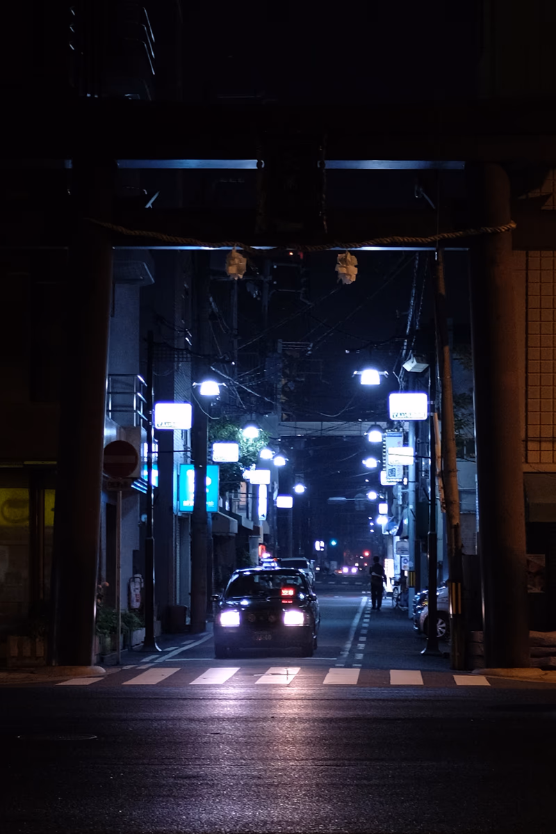 A nighttime street scene in Osaka, Japan.