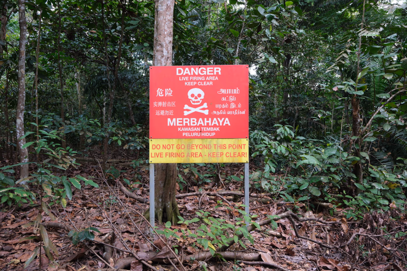 Warning sign in a forested area