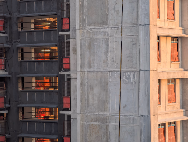 A photo of a building with a concrete facade and a window, taken near Lavender, None, Singapore.